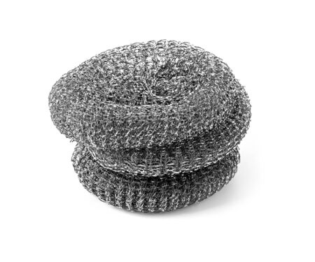 Metal sponge for washing dishes on a white backgroundの写真素材
