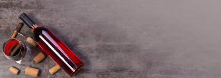 wine bottles and glass on table with copy space, backgroundの写真素材