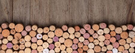 Closeup of a wall of used wine corks. A random selection of used wine corks, . Horizontal format that fills the frame.の写真素材