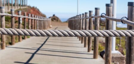 banister railing on marine ropeの写真素材