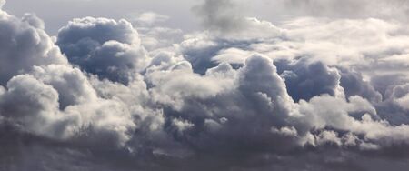Dark storm clouds sky backgroundの写真素材