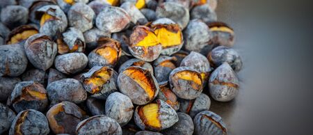 Bunch of roasted chestnuts at street wendor