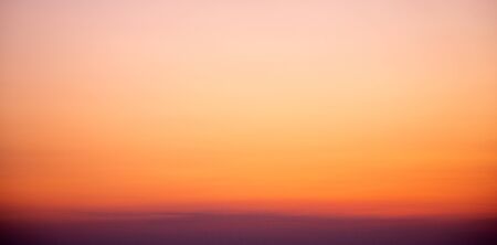 sunset sky background in orange colours