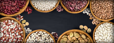 decorative set of beens and legumes on black  background