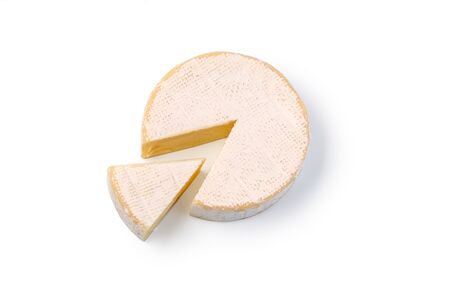 Brie cheese with cut slice isolated on a white background with clipping pathの写真素材