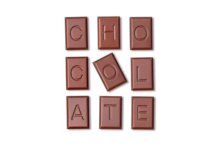 Chocolate word made from chocolate cubes on white backgroundの写真素材