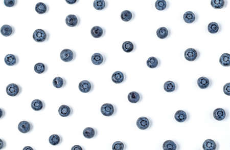 Blueberry antioxidant organic superfood. Fresh blueberries layout isolated on white. Macro texture of fresh blueberry berries closeup. Top viewの写真素材