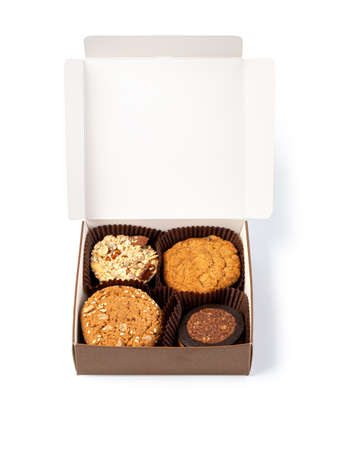 Open Paper Box with Cookies or Cakes on White Background, with clipping pathの写真素材