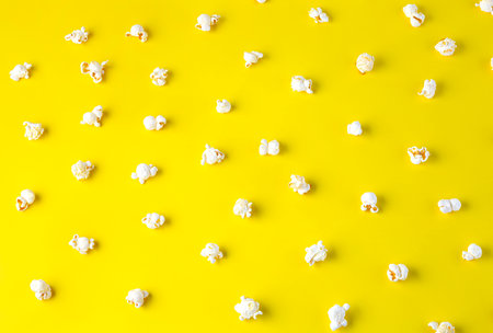 Popcorn pattern on yellow background. Top viewの写真素材