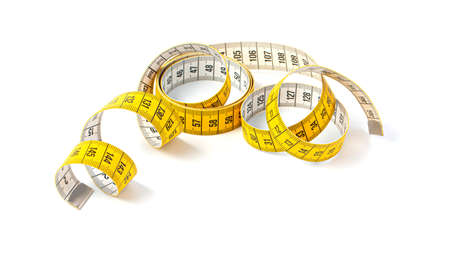 Measuring tape of tailor with indicators in form of centimeters. Yellow rolled measuring tape...