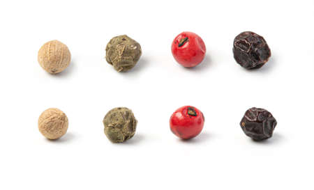 White, red and black peppercorns isolated. Peppercorn on white background. Pepper macro. Full depth...