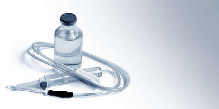 glass medicine bottle with syringe injection, dropper system isolated on white with copy spaceの写真素材