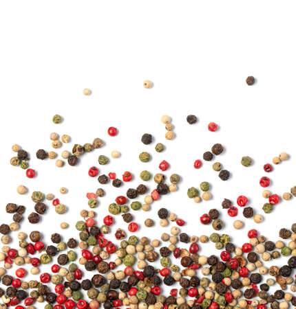 hot pepper, red, black, white and green pepper isolated on a white background. Top view