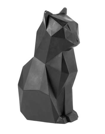 black cat on white triangle sculpture isolatedの写真素材