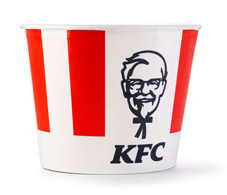Chisinau, Moldova September 01, 2021: A Bucket of KFC Chicken. Initially Kentucky Fried Chicken, founded by Harland Sanders, the fast food restaurant chain is now owned by Yum! Brands.のeditorial素材