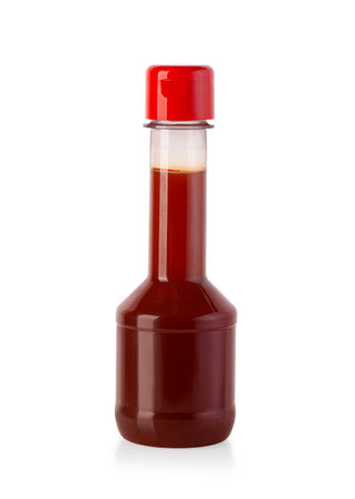 plastic bottle with bbq sauce isolated on white background with clipping pathの写真素材