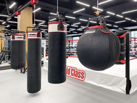 Anapa, Russia May 19, 2022:World Class Gym , Red and black punching bag with gym backgroundのeditorial素材