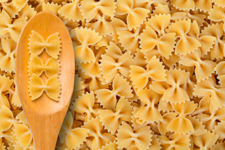 Raw farfalle pasta backgroundの写真素材