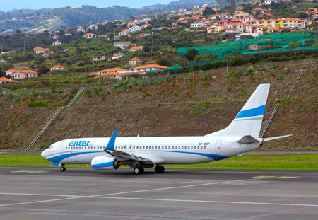 FUNCHAL, PORTUGAL - 31 December 2019: Airplanes docket at Cristiano Ronaldo International Airport at Madeiraのeditorial素材