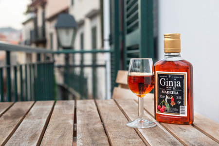 Madeira, Portugal, December 25, 2019; The bottle of local Ginja cherry fruit liqueur, Madeira, Portugalのeditorial素材