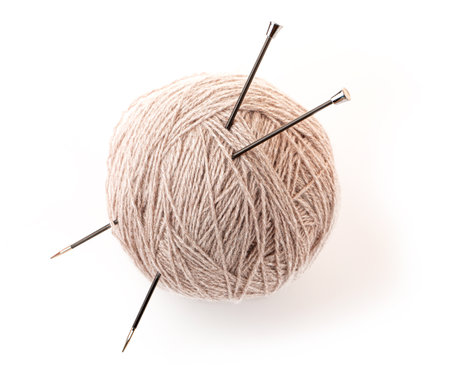 threads and knitting needles isolated on white backgroundのeditorial素材