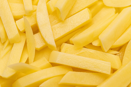 Sliced raw potatoes close upの写真素材