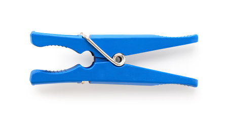 Blue plastic clothespin on a white background.with clipping pathの写真素材