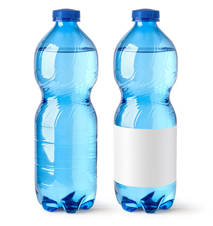 Two small water bottles isolated on white background, one with blank white label and one without labelの写真素材