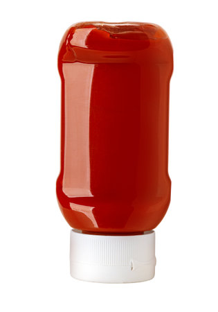 Red plastic bottle of ketchup isolated on white background