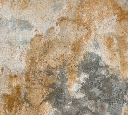 Grunge concrete wall showing abstract patterns of weathered texture and peeled paintの写真素材