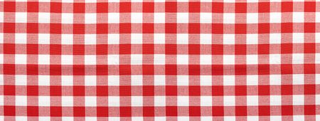 Gingham checkered tablecloth fabric with a pattern of red and white squares