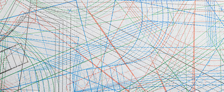 Overlapping colorful lines on white paper representing tailoring blueprints