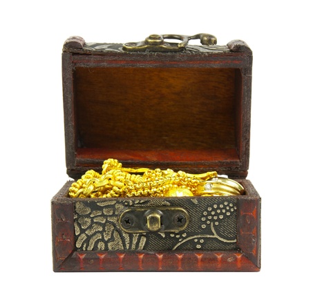 gold in ancient treasure chest, isolatedの写真素材