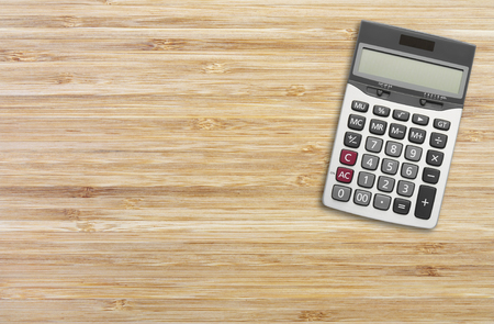 wood texture with calculator for background, horizontalの写真素材