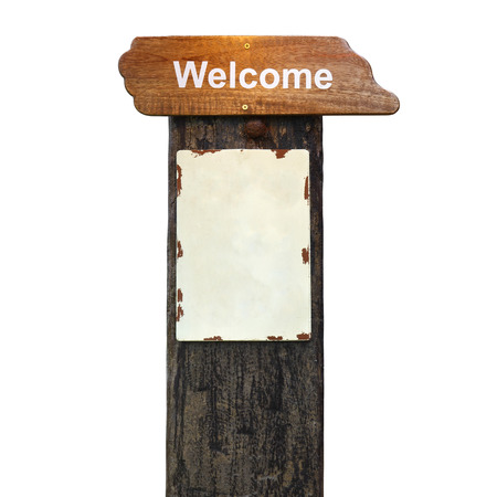 vintage wood welcome plate and blank signboard post on old wooden pole at hotel or resort for tourism on white background isolated included clipping pathの写真素材
