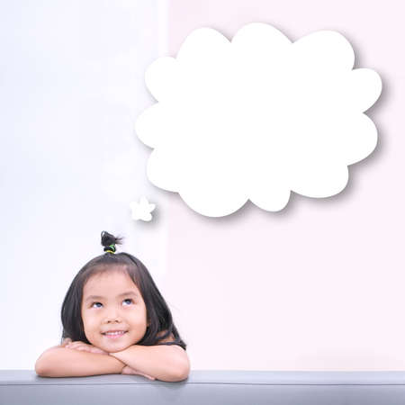 Asian child cute or kid girl and student thinking with looking on top white cloud for new idea and...
