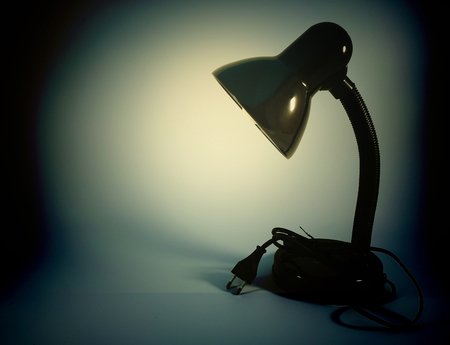 Black lamp in dark roomの写真素材