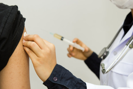 Doctor give injectionの写真素材