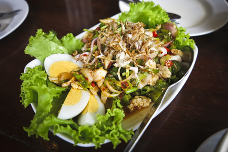 Spicy Shrimp and betel nuts with pork and boiled eggの写真素材