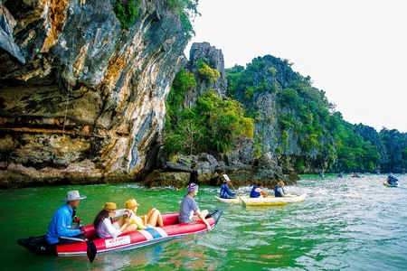 Wooden boat next to houseのeditorial素材