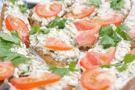 Sandwiches with fish, tomatoes and parsleyの写真素材