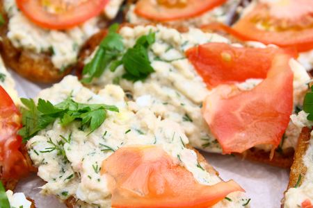 Sandwiches with fish, tomatoes and parsleyの写真素材