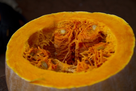 Half pumpkin with seedsの写真素材