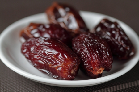 Sweet dates on the plateの写真素材