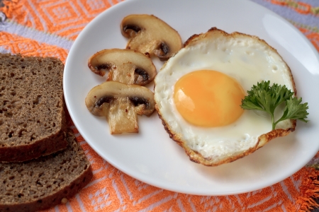 Fried mushrooms and eggの写真素材