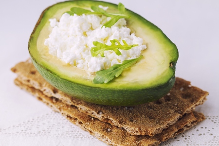 Sandwich of crispy bread wiht avocadoの写真素材