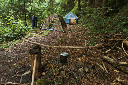 Kettle over campfire