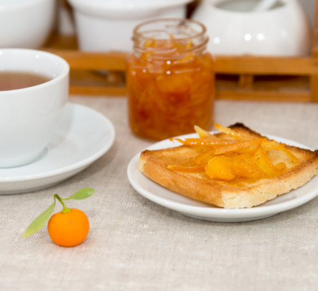 Breakfast of orange marmalade on toastの写真素材