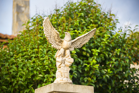 OLIVELLA, SPAIN - Decorative figure of an eagle on the fence. Barcelona province, Catalonia, Spainの写真素材