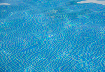 Blue water in swimming pool